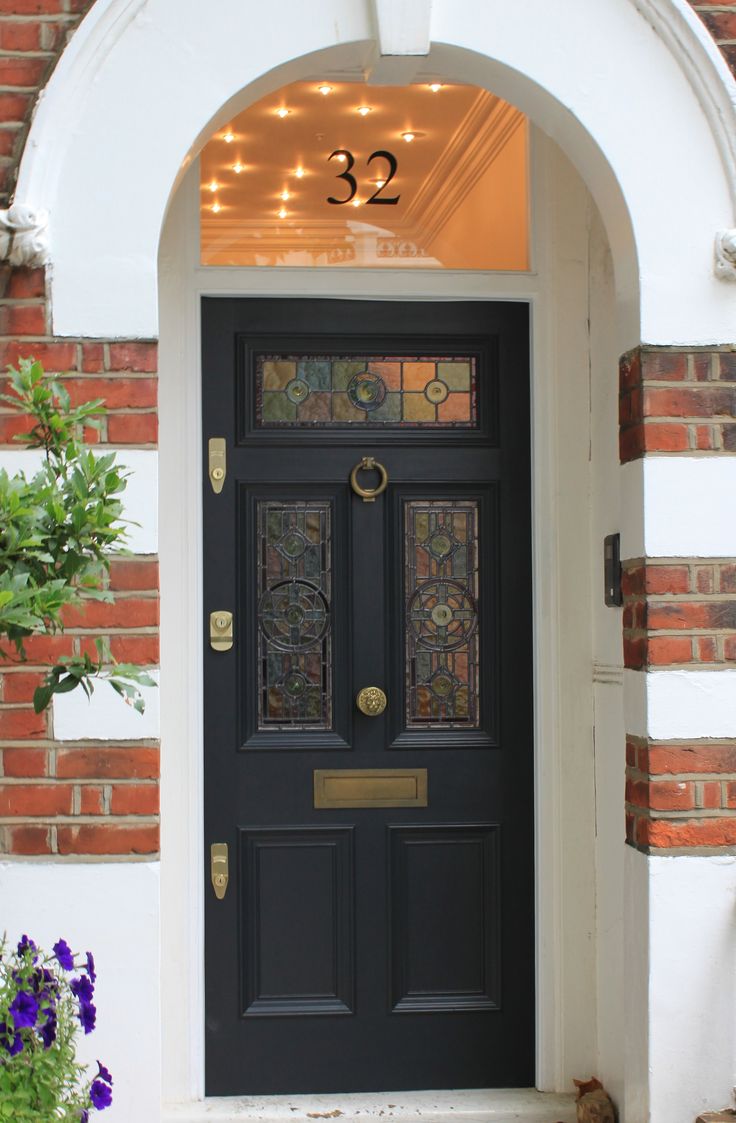 French country double entry doors give charming completions to the