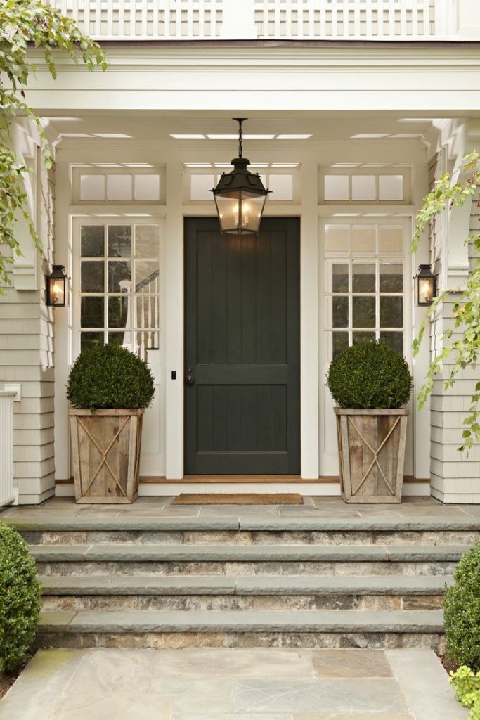 French country double entry doors give charming completions to the