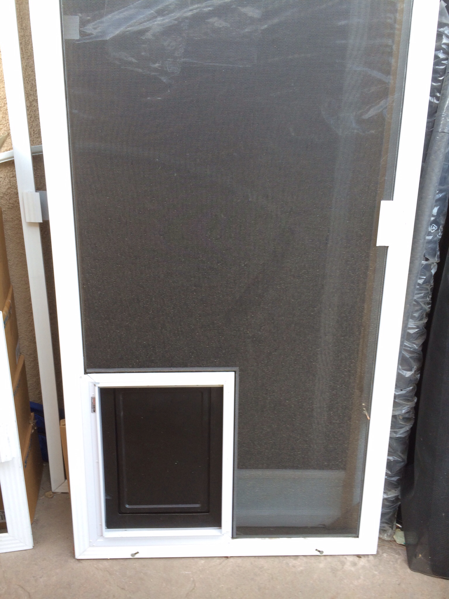 screen door with dog door