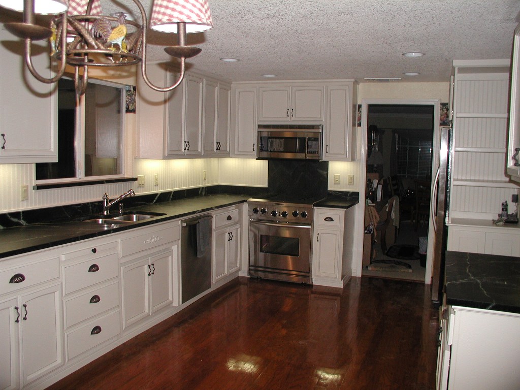 kitchen white cabinets dark countertops photo - 6